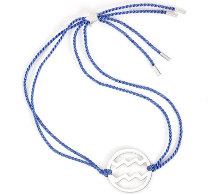 silver aquarius zodiac bracelet with blue cord