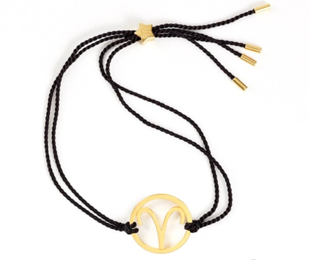 aries gold bracelet with black cord