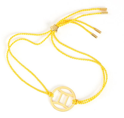 gemini gold bracelet with yellow cord