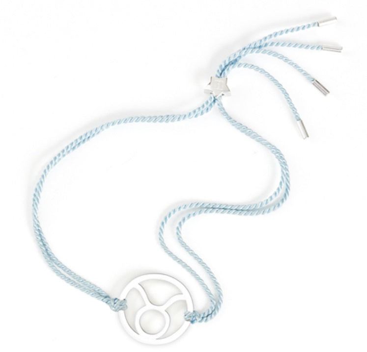 silver taurus bracelet with adjustable light blue cord