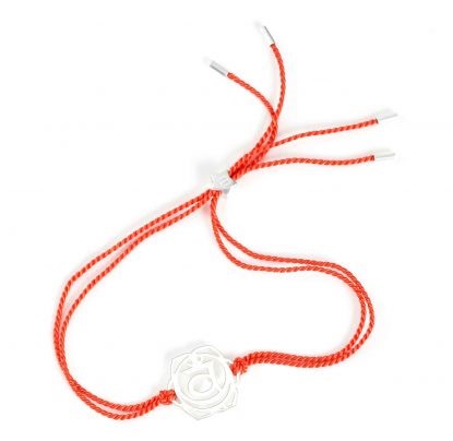 the sacral chakra in silver with orange cord